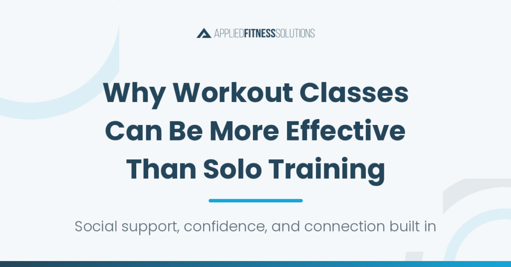 Members of a group workout class training together with a coach at Applied Fitness Solutions in Ann Arbo