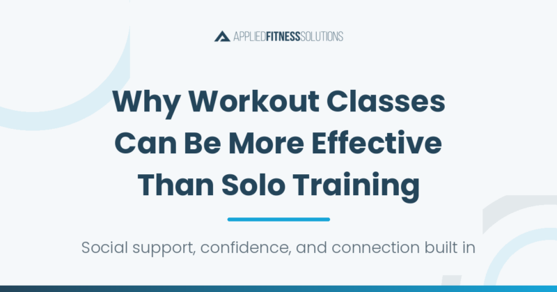 Members of a group workout class training together with a coach at Applied Fitness Solutions in Ann Arbo